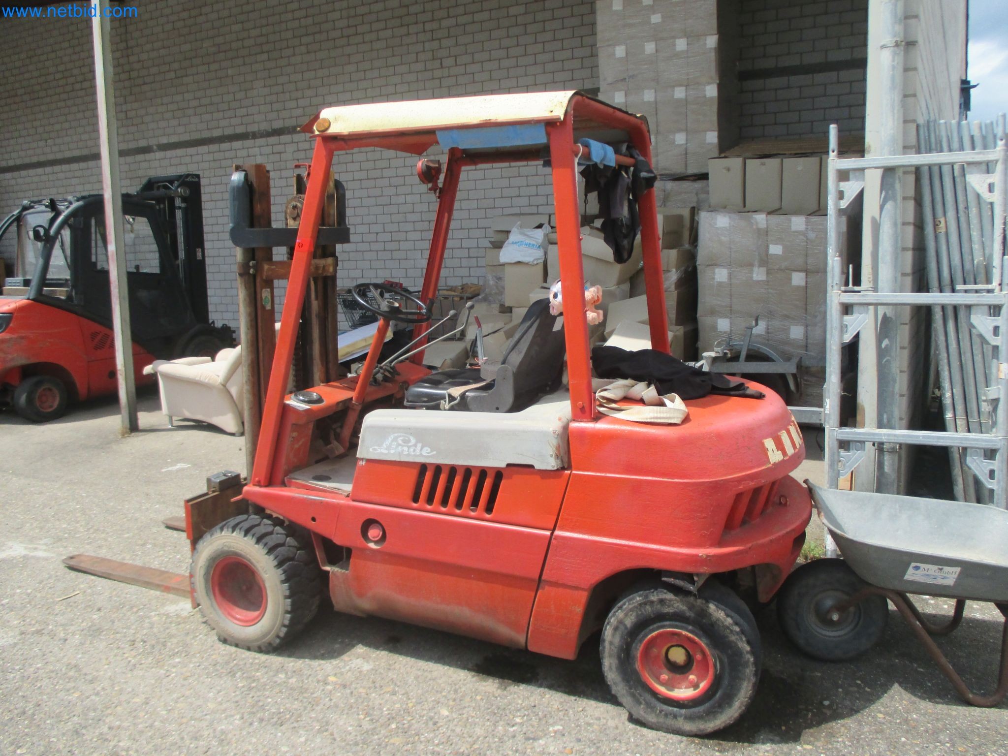 Scaffolding components (some from the construction site), machinery, and vehicles belonging to a construction company-2