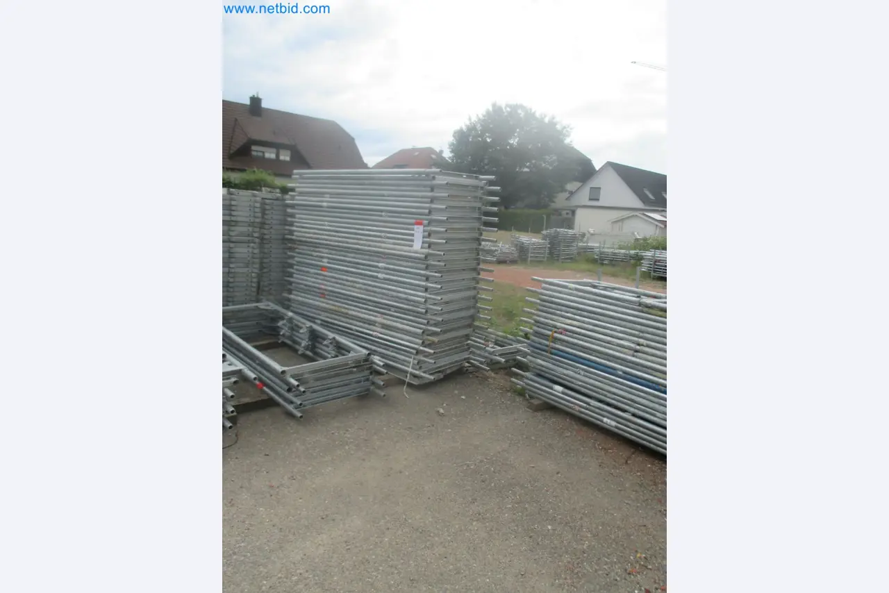 Scaffolding components (some from the construction site), machinery, and vehicles belonging to a construction company-10