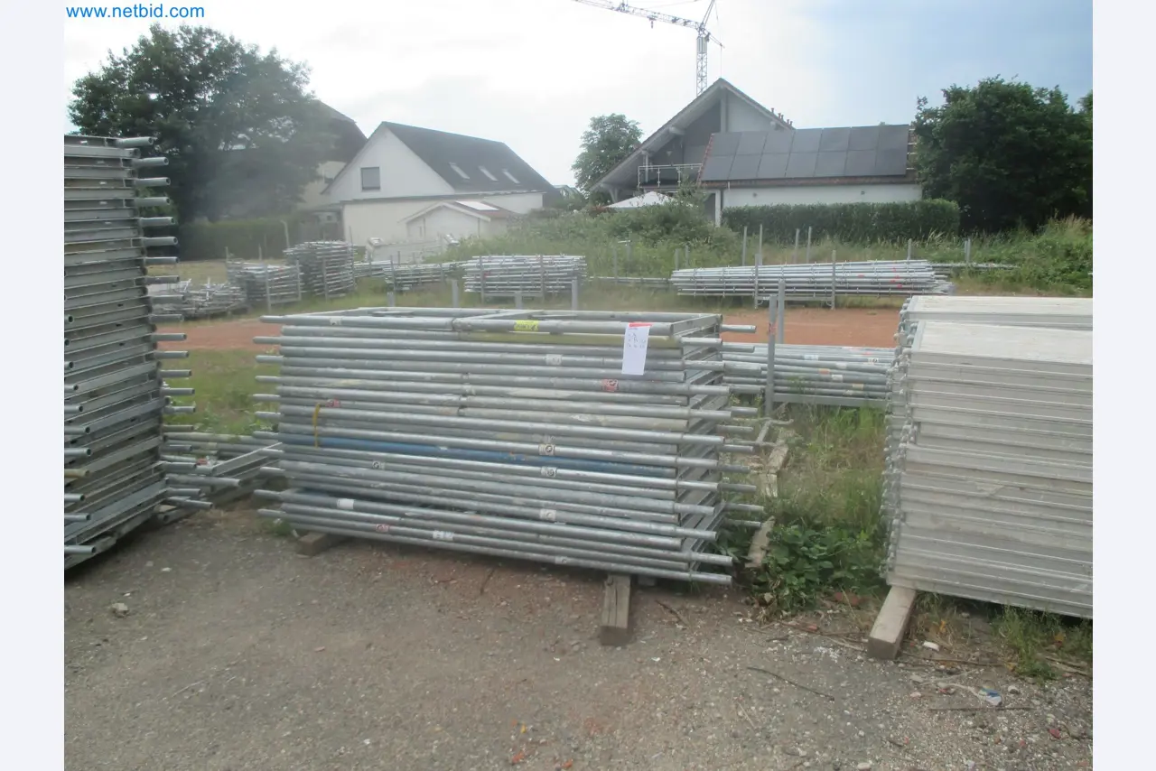 Scaffolding components (some from the construction site), machinery, and vehicles belonging to a construction company-11