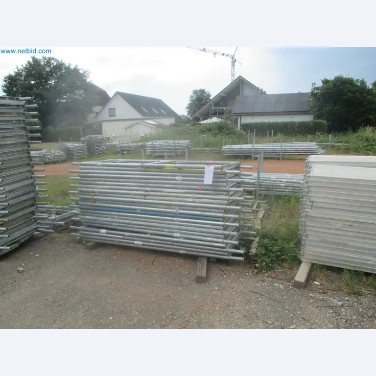 Scaffolding components (some from the construction site), machinery, and vehicles belonging to a construction company-11
