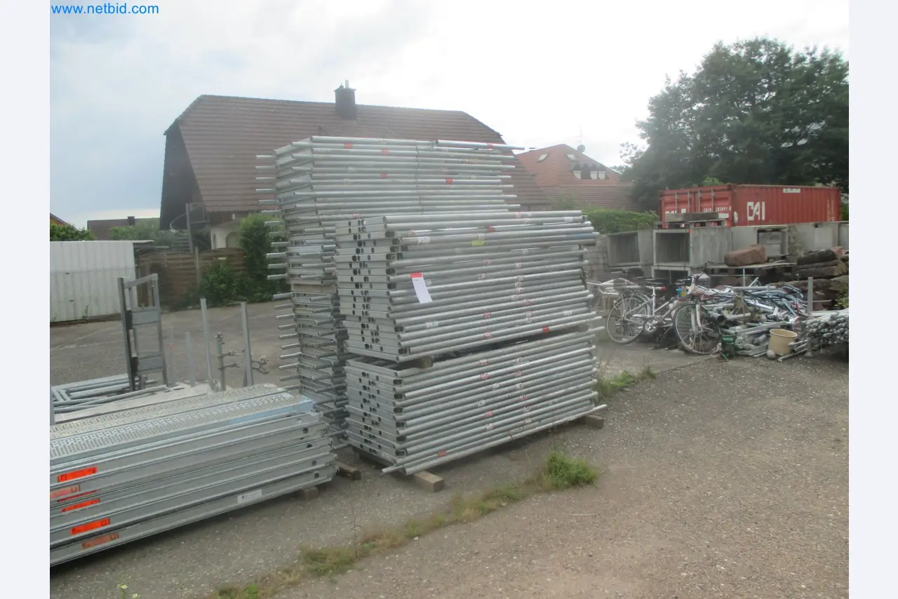 Scaffolding components (some from the construction site), machinery, and vehicles belonging to a construction company-12