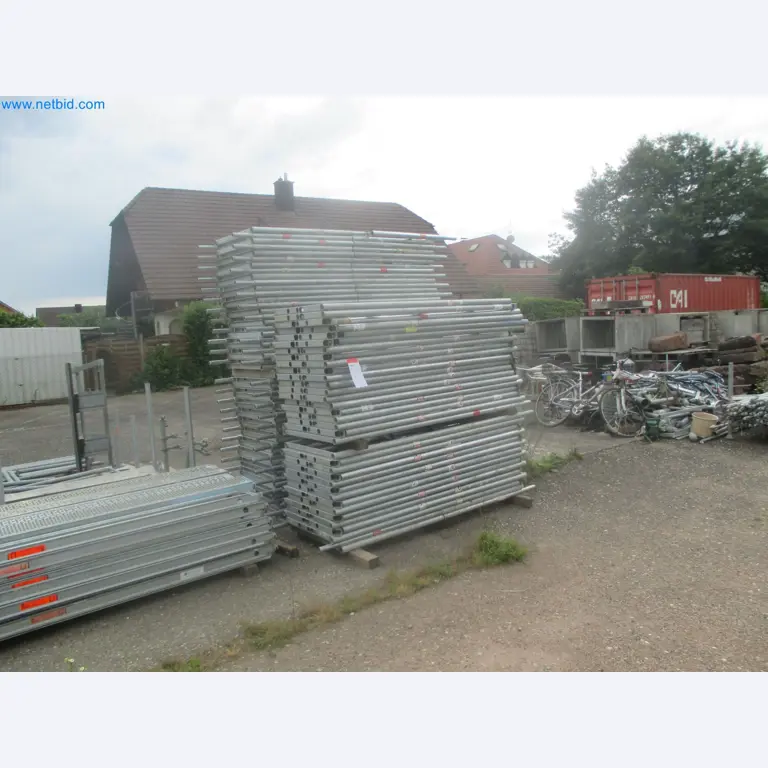Scaffolding components (some from the construction site), machinery, and vehicles belonging to a construction company-12
