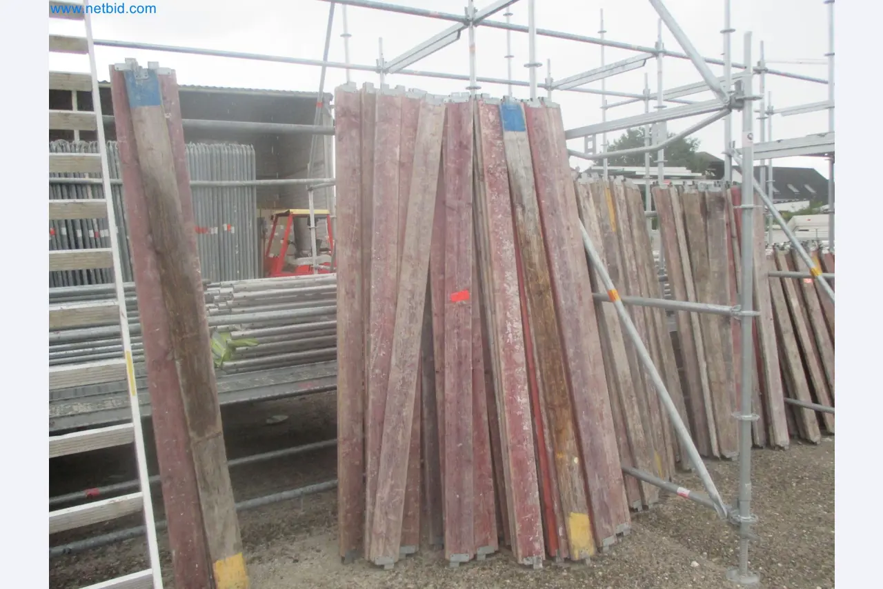 Scaffolding components (some from the construction site), machinery, and vehicles belonging to a construction company-14