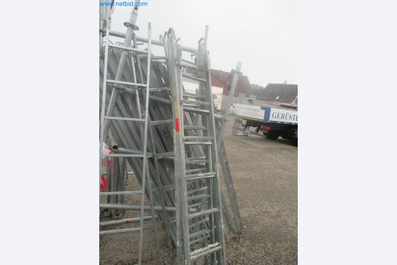 Scaffolding components (some from the construction site), machinery, and vehicles belonging to a construction company-15