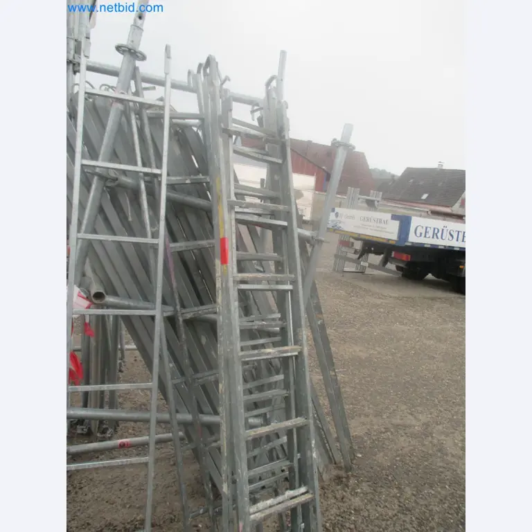 Scaffolding components (some from the construction site), machinery, and vehicles belonging to a construction company-15