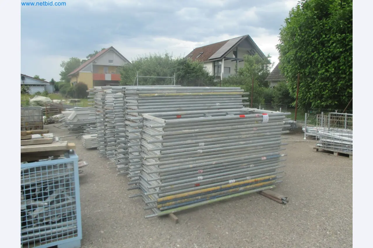 Scaffolding components (some from the construction site), machinery, and vehicles belonging to a construction company-16