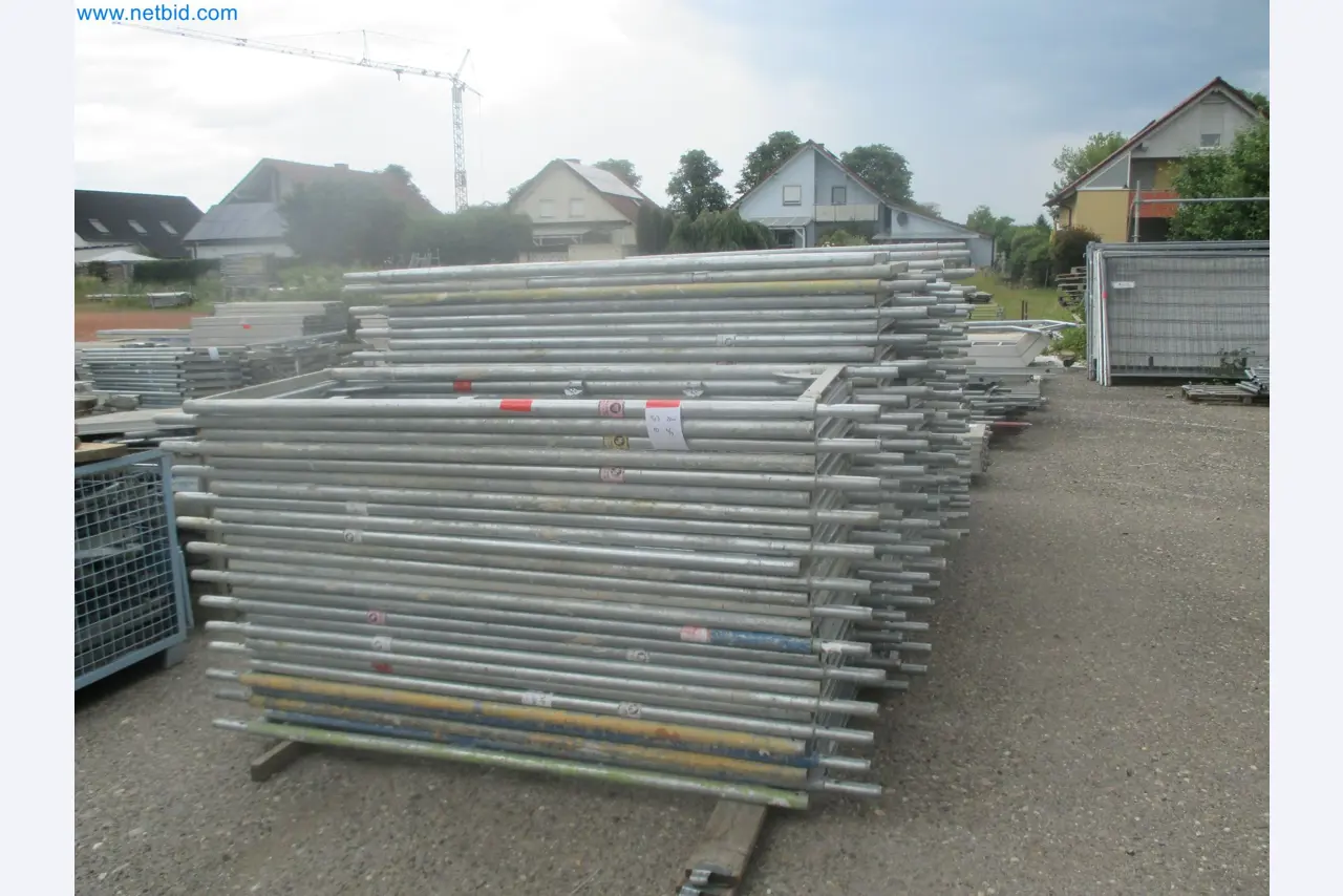 Scaffolding components (some from the construction site), machinery, and vehicles belonging to a construction company-17