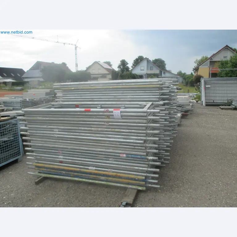 Scaffolding components (some from the construction site), machinery, and vehicles belonging to a construction company-17
