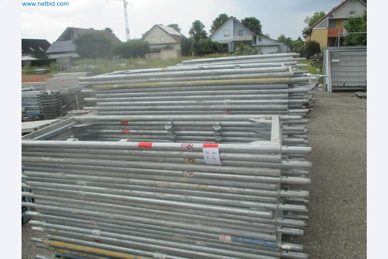 Scaffolding components (some from the construction site), machinery, and vehicles belonging to a construction company-18