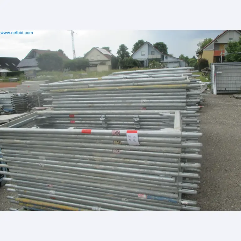 Scaffolding components (some from the construction site), machinery, and vehicles belonging to a construction company-18