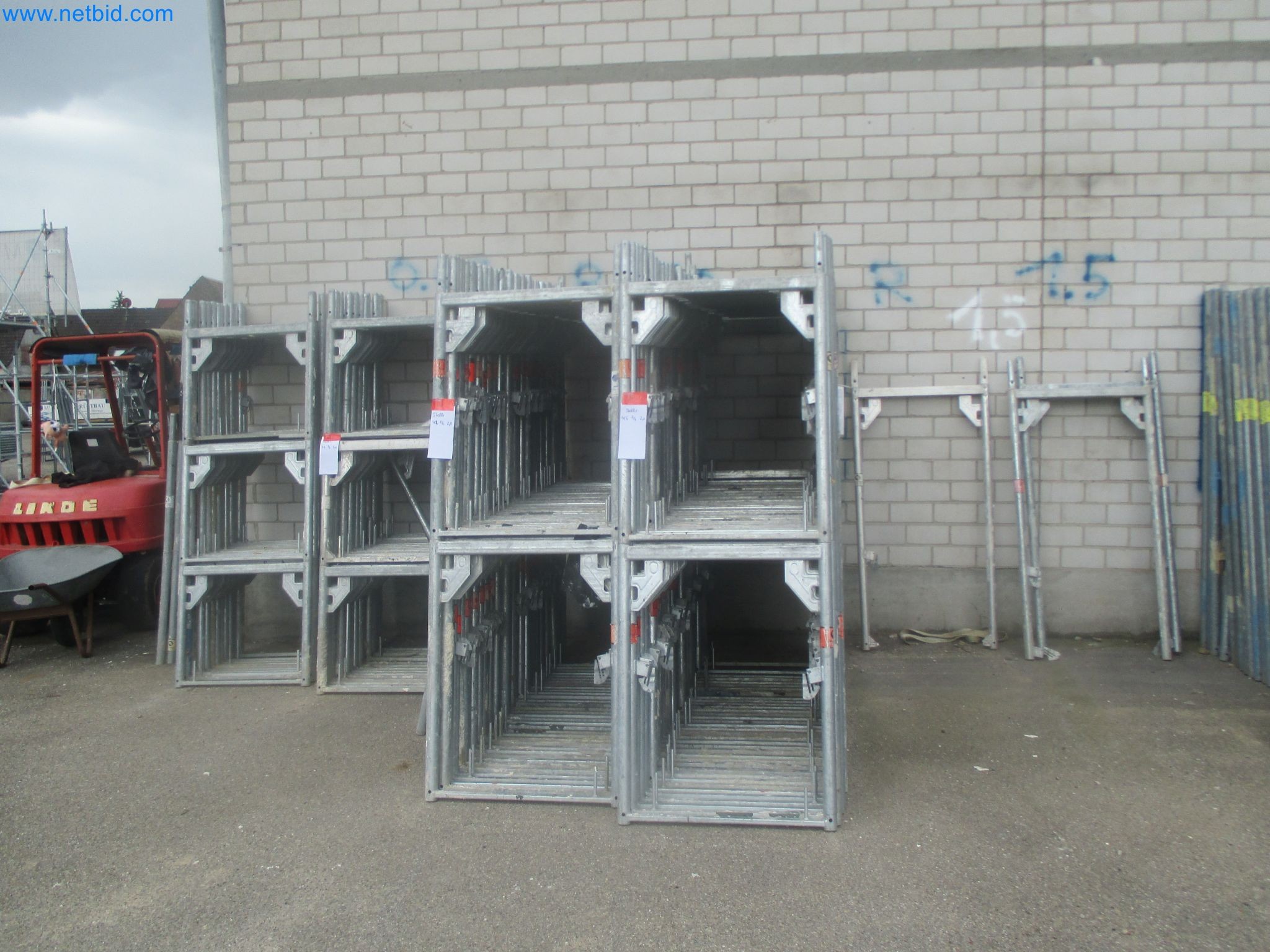 Scaffolding components (some from the construction site), machinery, and vehicles belonging to a construction company-2