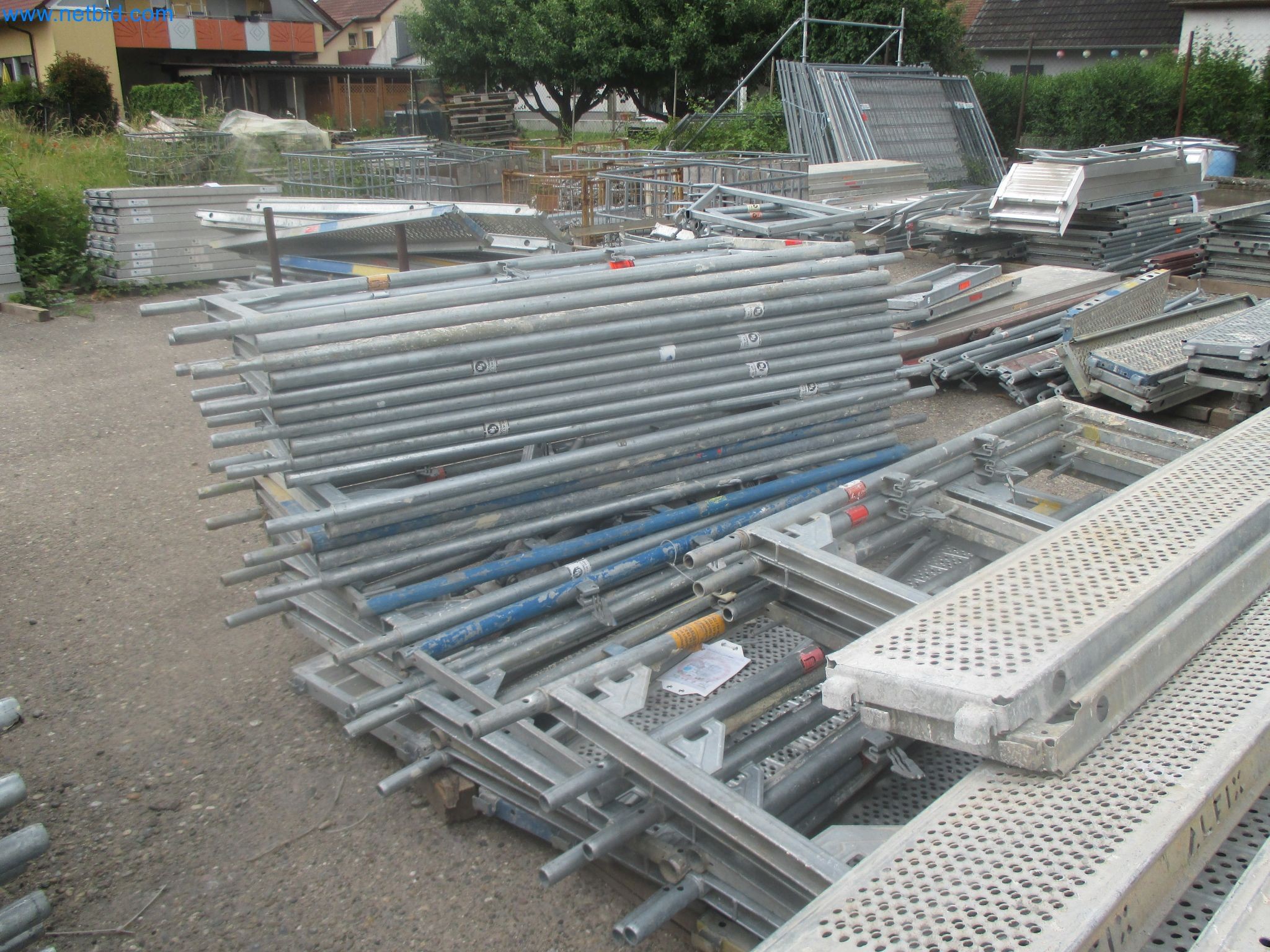 Scaffolding components (some from the construction site), machinery, and vehicles belonging to a construction company-3