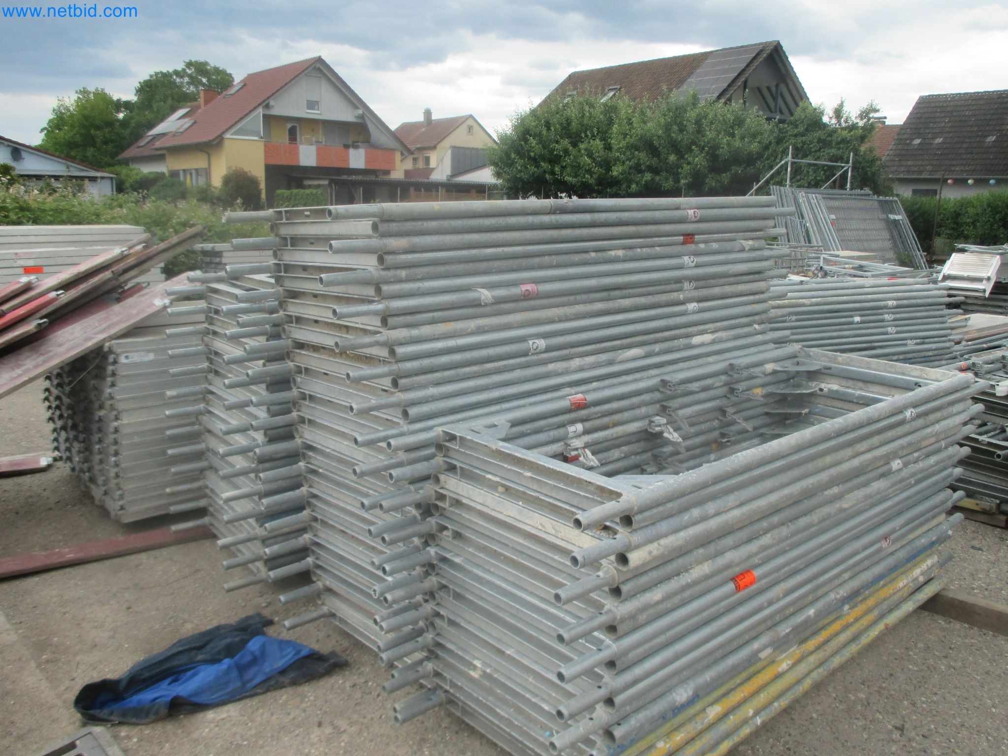 Scaffolding components (some from the construction site), machinery, and vehicles belonging to a construction company-4