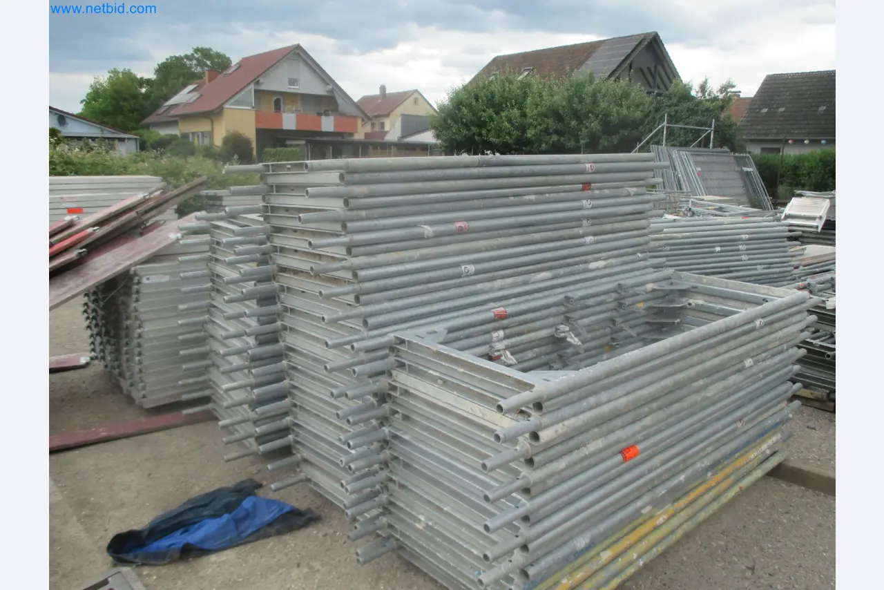 Scaffolding components (some from the construction site), machinery, and vehicles belonging to a construction company-4