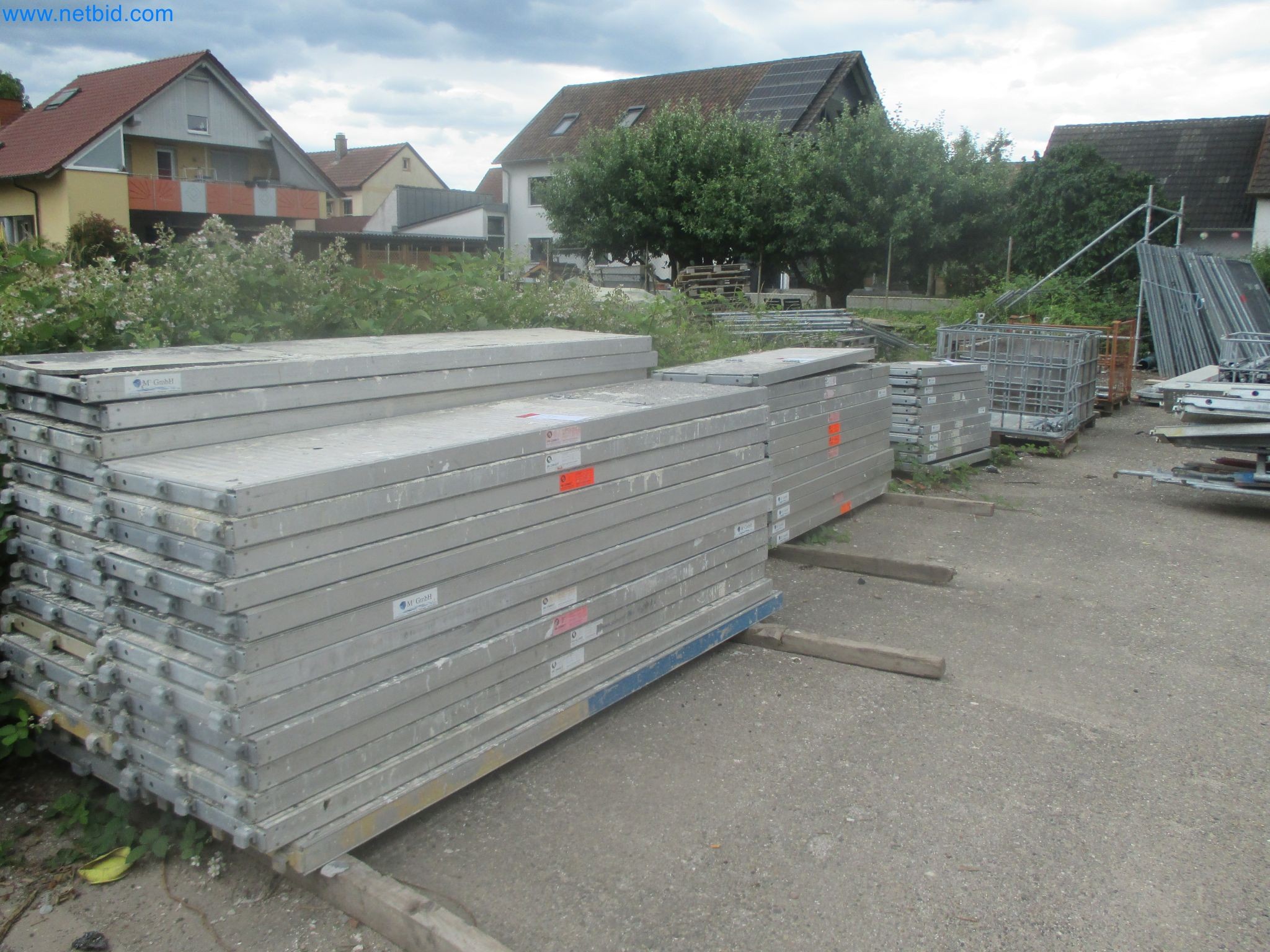 Scaffolding components (some from the construction site), machinery, and vehicles belonging to a construction company-5