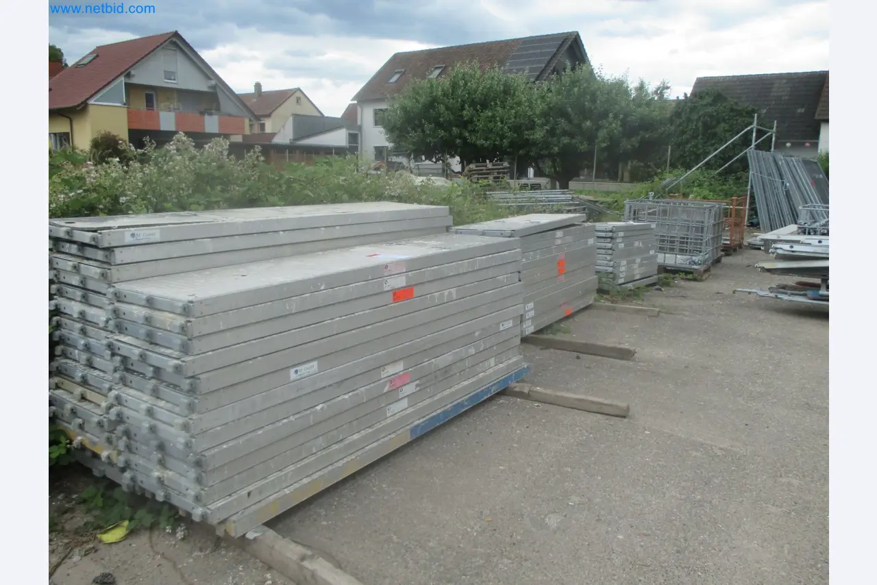 Scaffolding components (some from the construction site), machinery, and vehicles belonging to a construction company-5