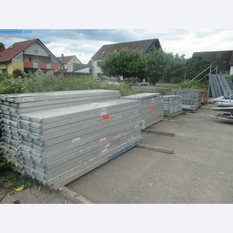 Scaffolding components (some from the construction site), machinery, and vehicles belonging to a construction company-5
