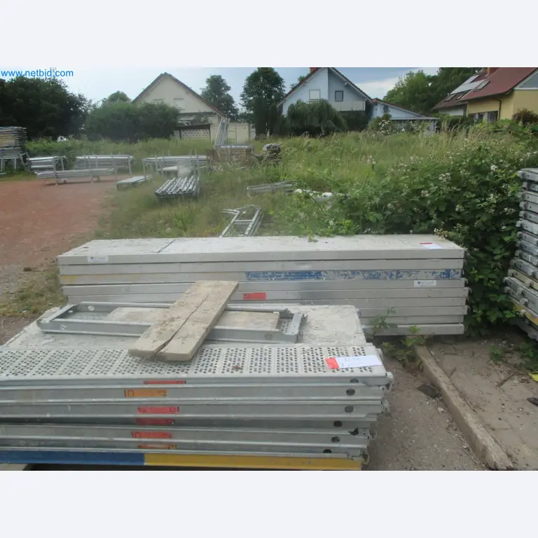 Scaffolding components (some from the construction site), machinery, and vehicles belonging to a construction company-6
