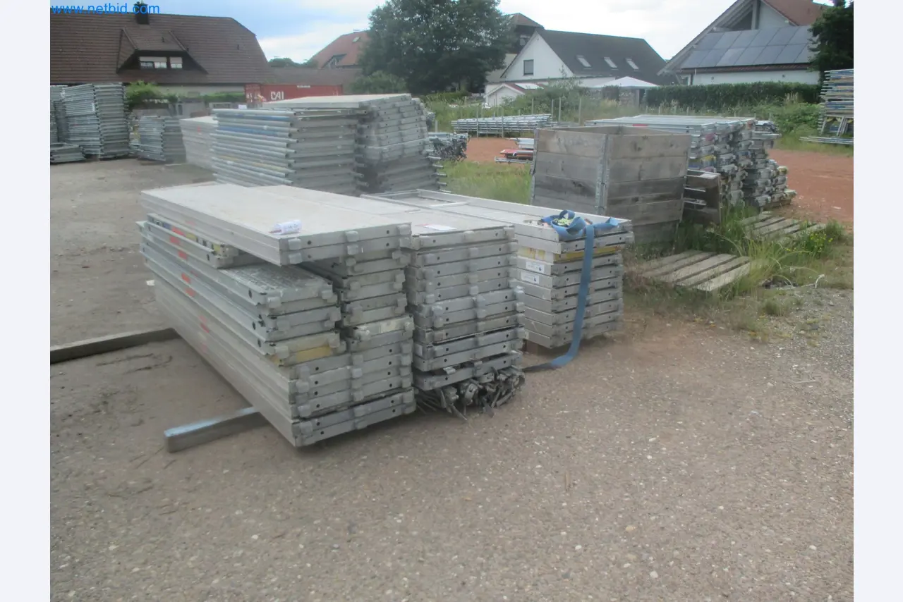Scaffolding components (some from the construction site), machinery, and vehicles belonging to a construction company-7