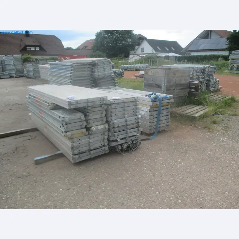 Scaffolding components (some from the construction site), machinery, and vehicles belonging to a construction company-7