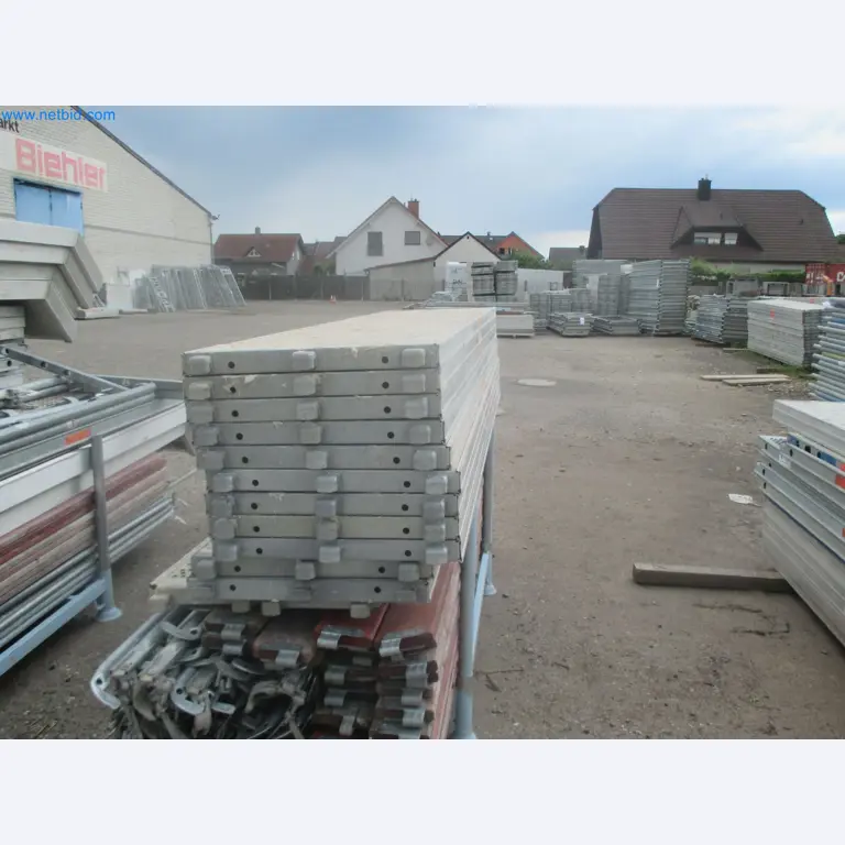 Scaffolding components (some from the construction site), machinery, and vehicles belonging to a construction company-8