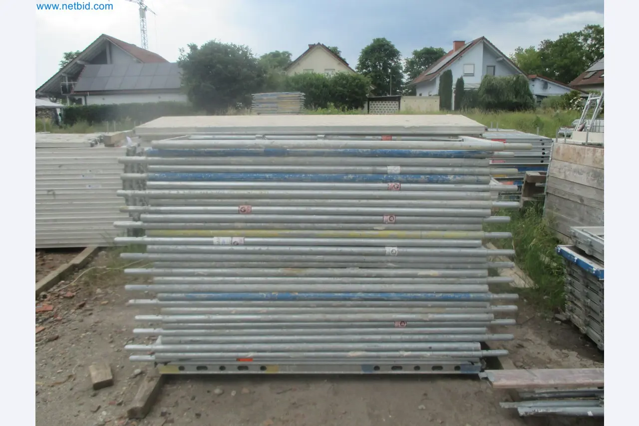 Scaffolding components (some from the construction site), machinery, and vehicles belonging to a construction company-9