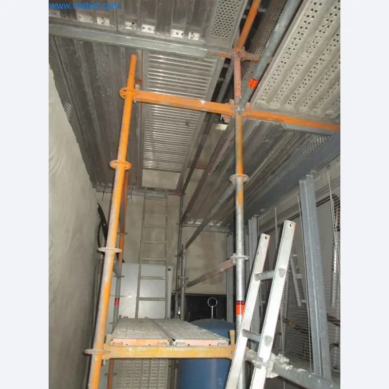 Scaffolding components (some from the construction site), machinery, and vehicles belonging to a construction company-12
