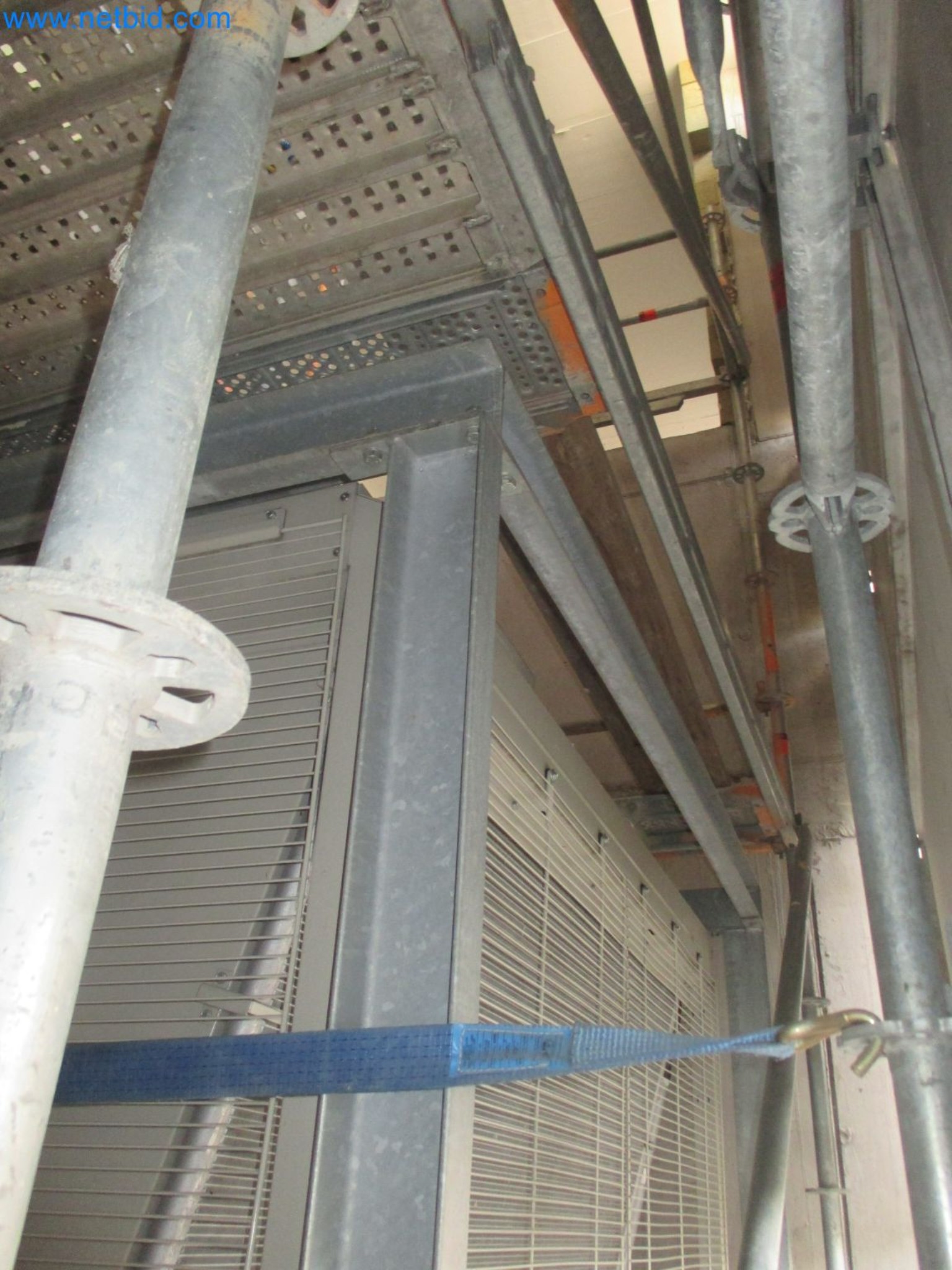 Scaffolding components (some from the construction site), machinery, and vehicles belonging to a construction company-13