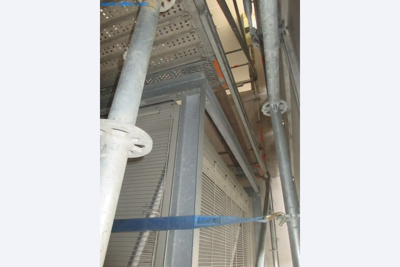Scaffolding components (some from the construction site), machinery, and vehicles belonging to a construction company-13