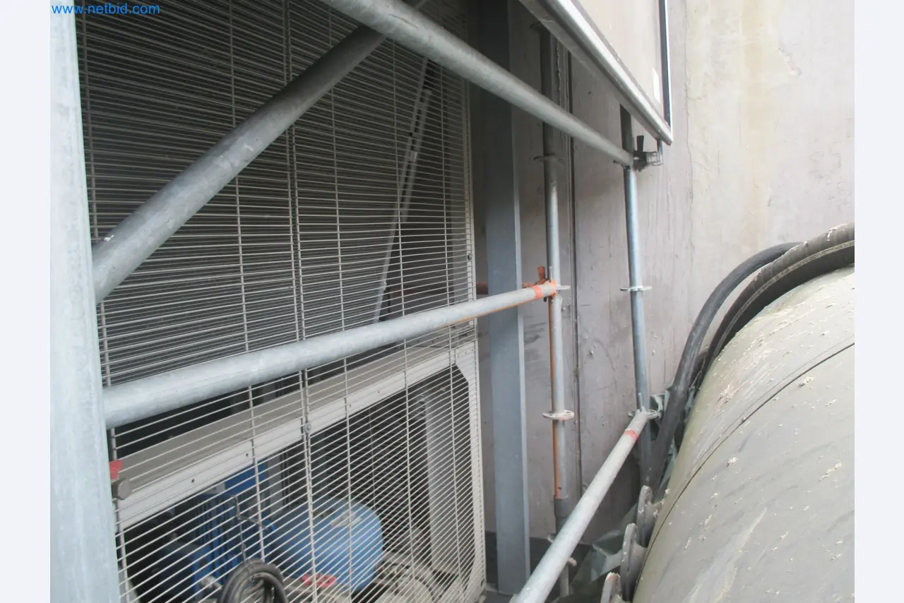 Scaffolding components (some from the construction site), machinery, and vehicles belonging to a construction company-14