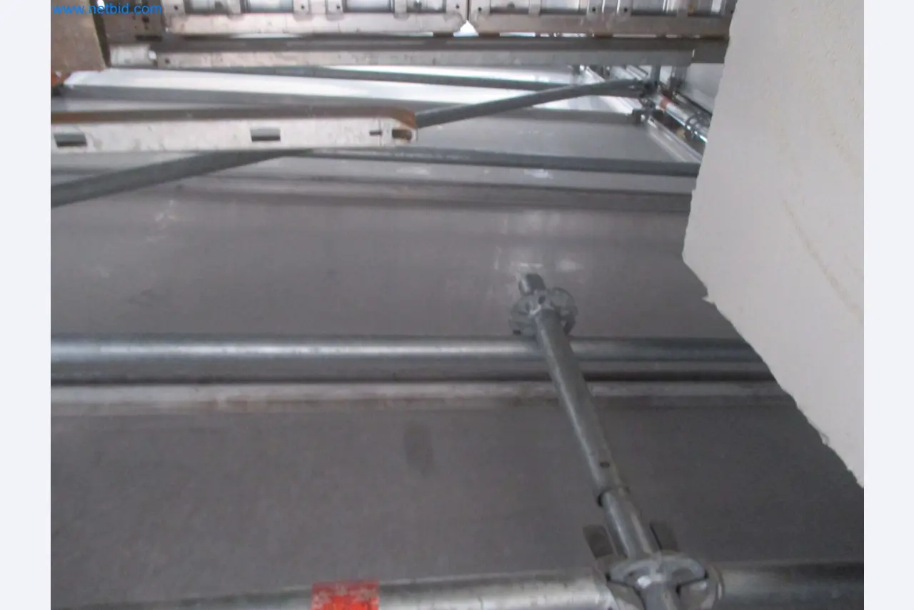 Scaffolding components (some from the construction site), machinery, and vehicles belonging to a construction company-5