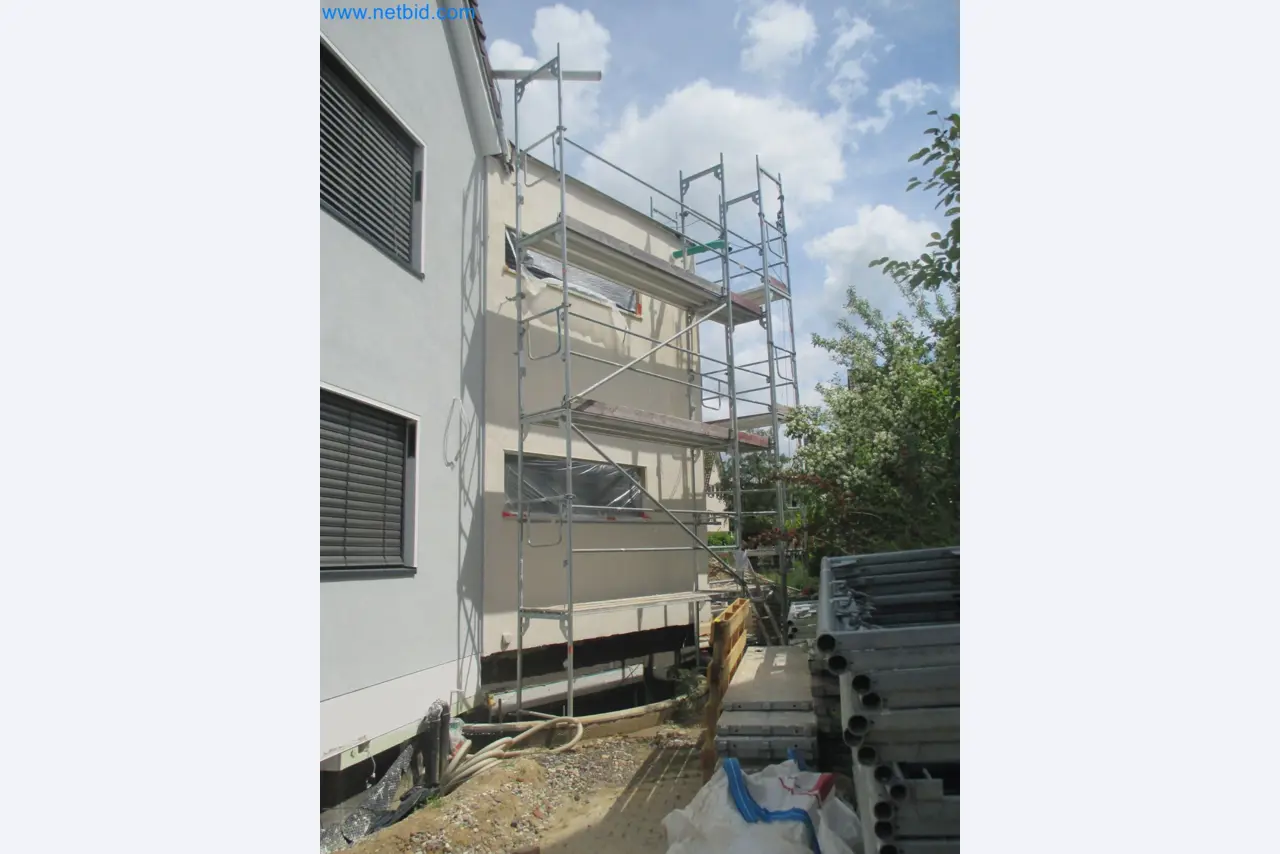 Scaffolding components (some from the construction site), machinery, and vehicles belonging to a construction company-7
