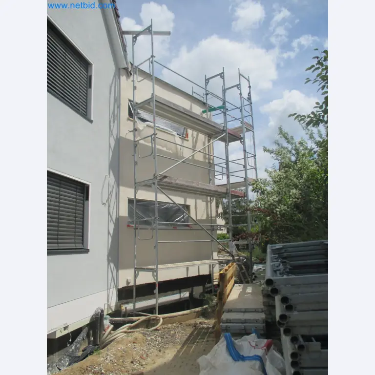 Scaffolding components (some from the construction site), machinery, and vehicles belonging to a construction company-7
