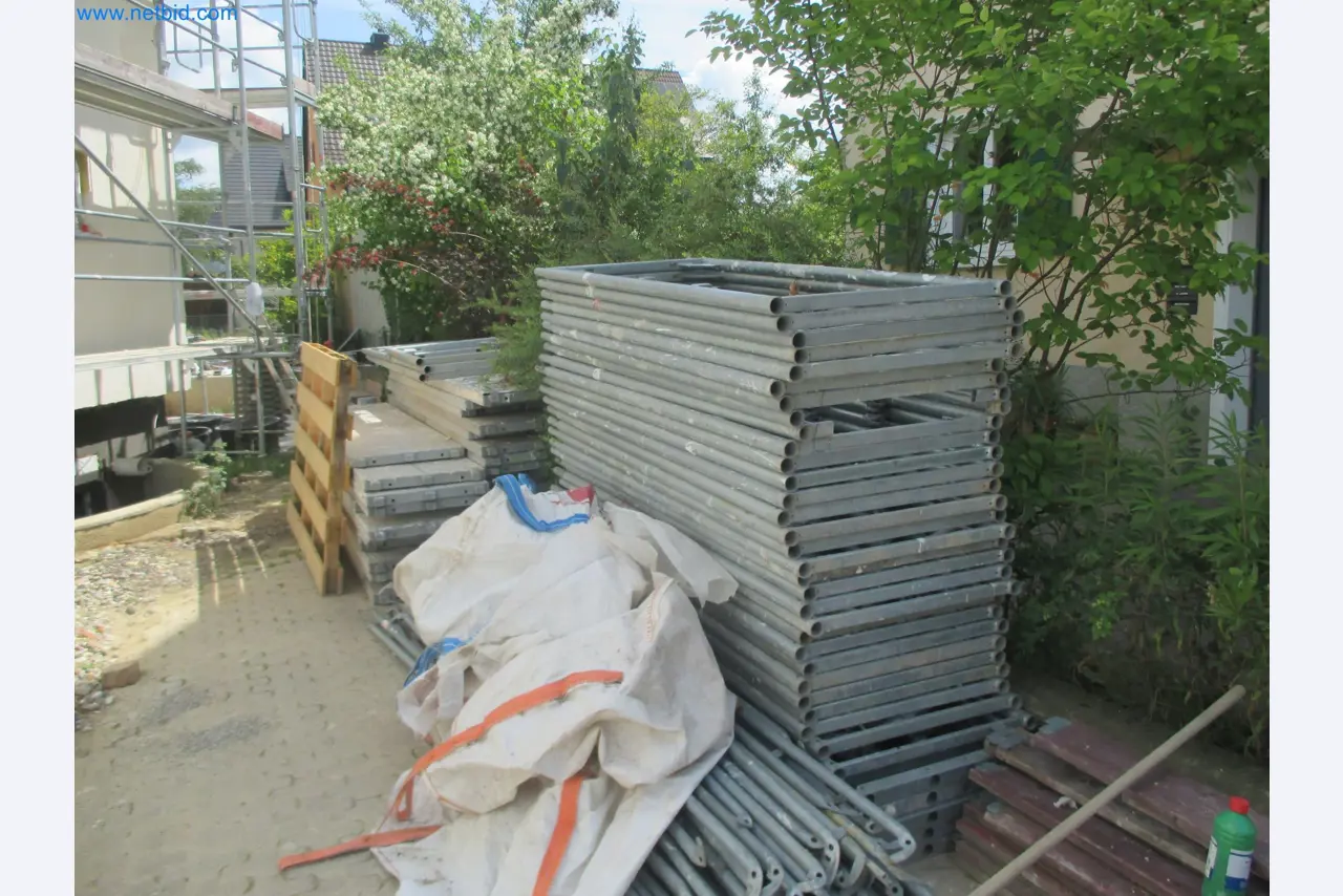 Scaffolding components (some from the construction site), machinery, and vehicles belonging to a construction company-8