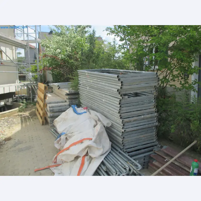 Scaffolding components (some from the construction site), machinery, and vehicles belonging to a construction company-8