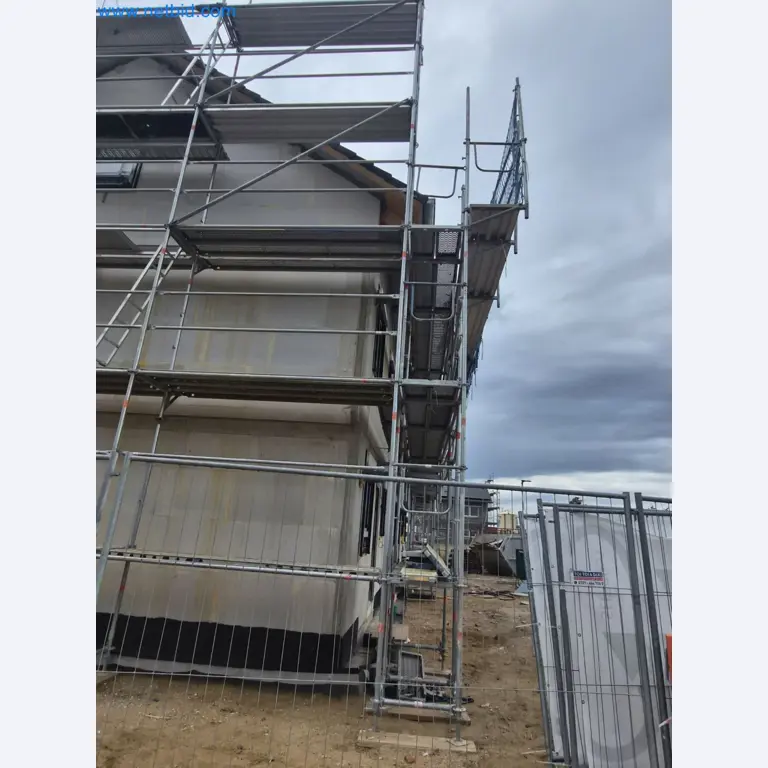 Scaffolding components (some from the construction site), machinery, and vehicles belonging to a construction company-4