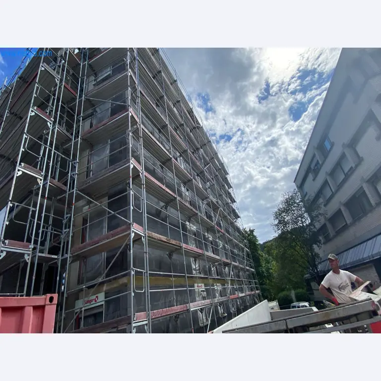 Scaffolding components (some from the construction site), machinery, and vehicles belonging to a construction company-1