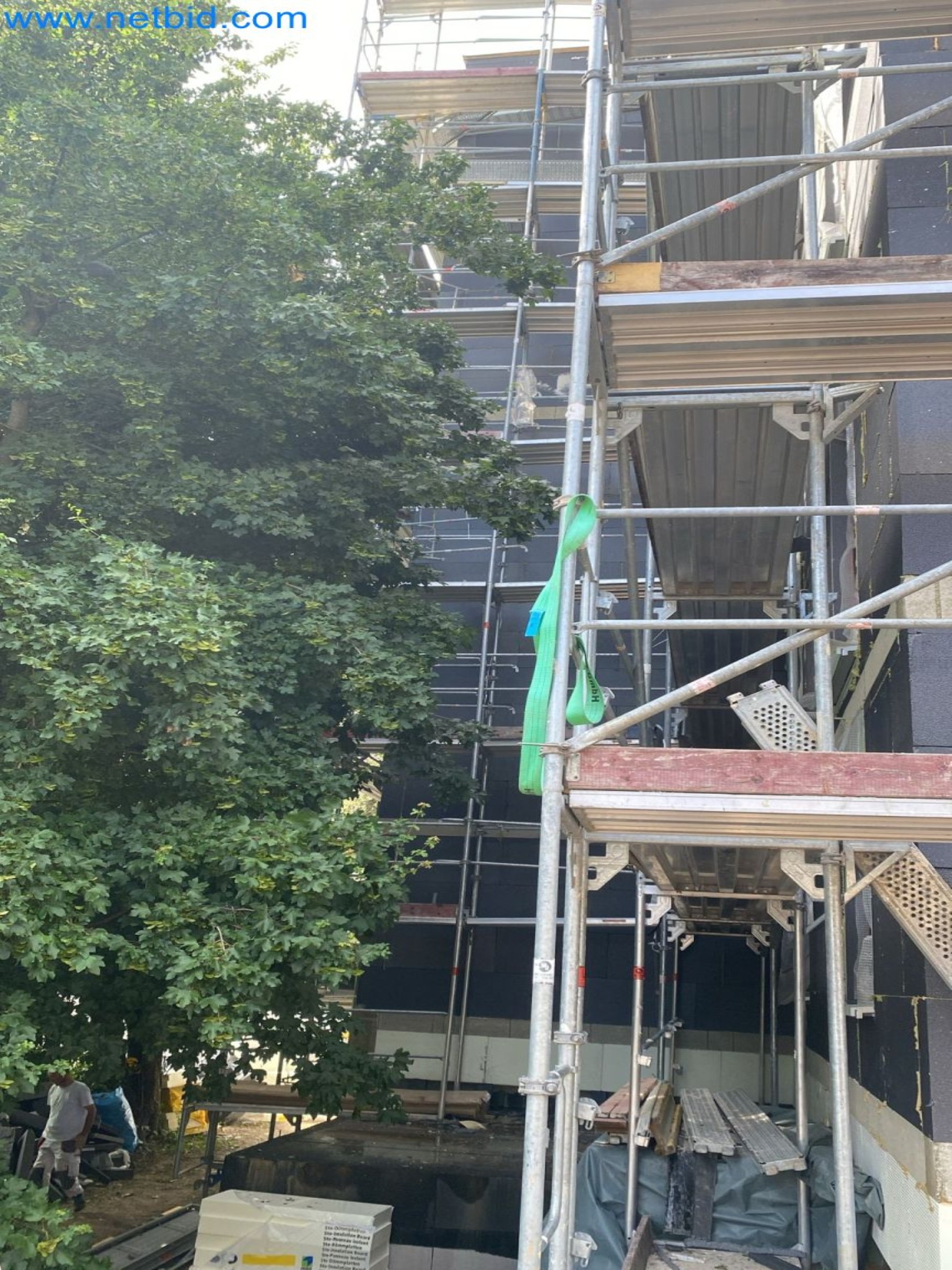 Scaffolding components (some from the construction site), machinery, and vehicles belonging to a construction company-4