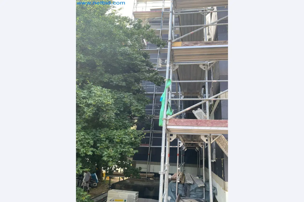Scaffolding components (some from the construction site), machinery, and vehicles belonging to a construction company-4