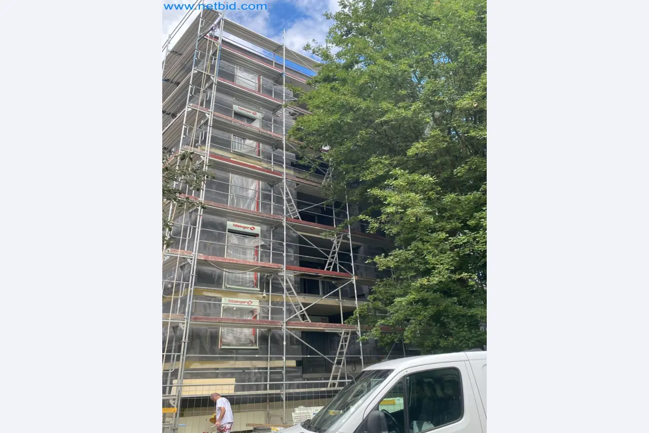 Scaffolding components (some from the construction site), machinery, and vehicles belonging to a construction company-5