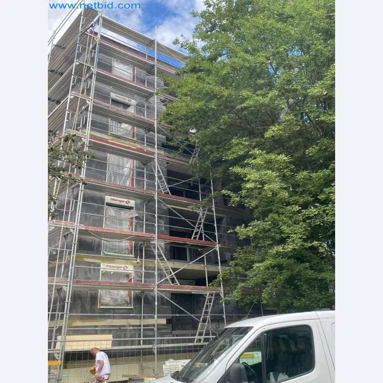 Scaffolding components (some from the construction site), machinery, and vehicles belonging to a construction company-5