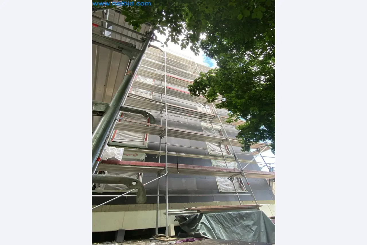 Scaffolding components (some from the construction site), machinery, and vehicles belonging to a construction company-8