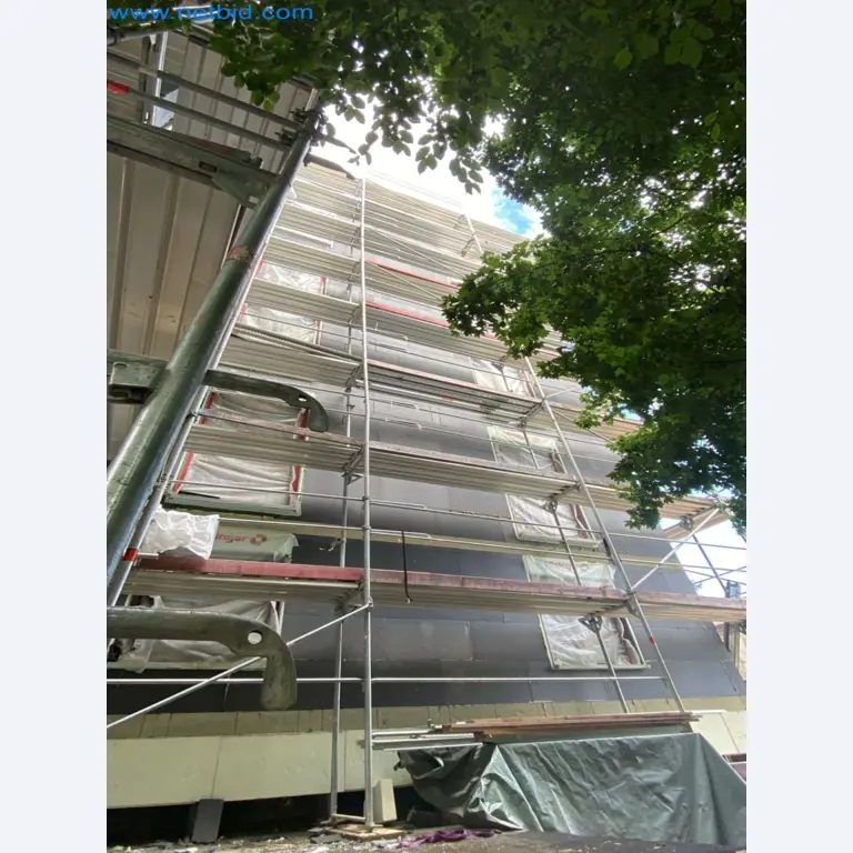 Scaffolding components (some from the construction site), machinery, and vehicles belonging to a construction company-8