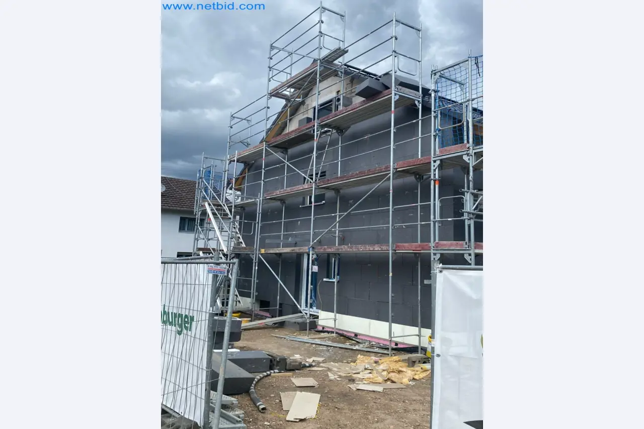 Scaffolding components (some from the construction site), machinery, and vehicles belonging to a construction company-2