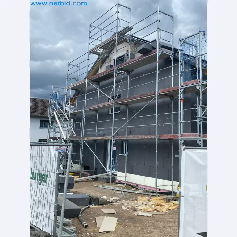 Scaffolding components (some from the construction site), machinery, and vehicles belonging to a construction company-2