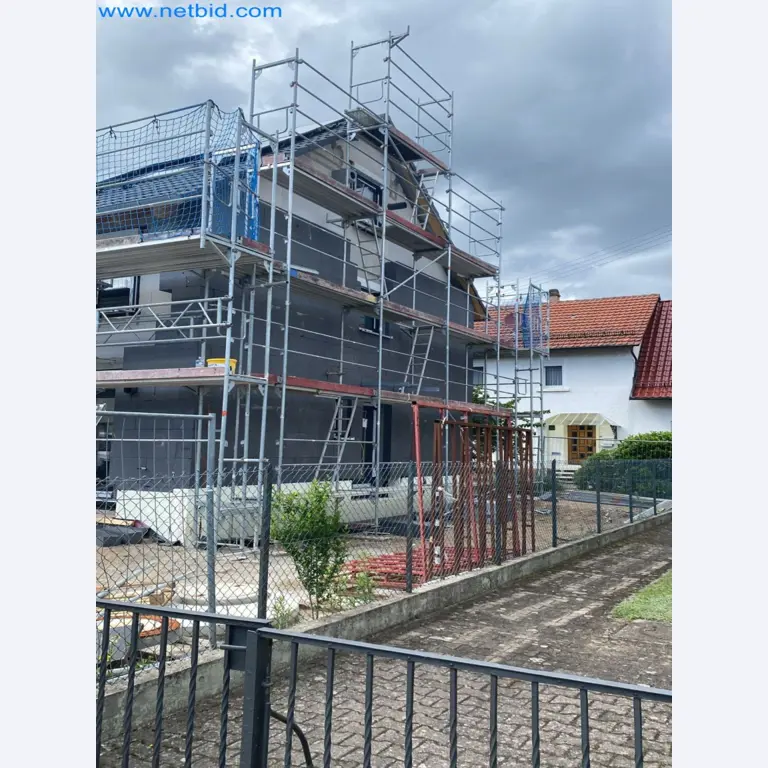 Scaffolding components (some from the construction site), machinery, and vehicles belonging to a construction company-3