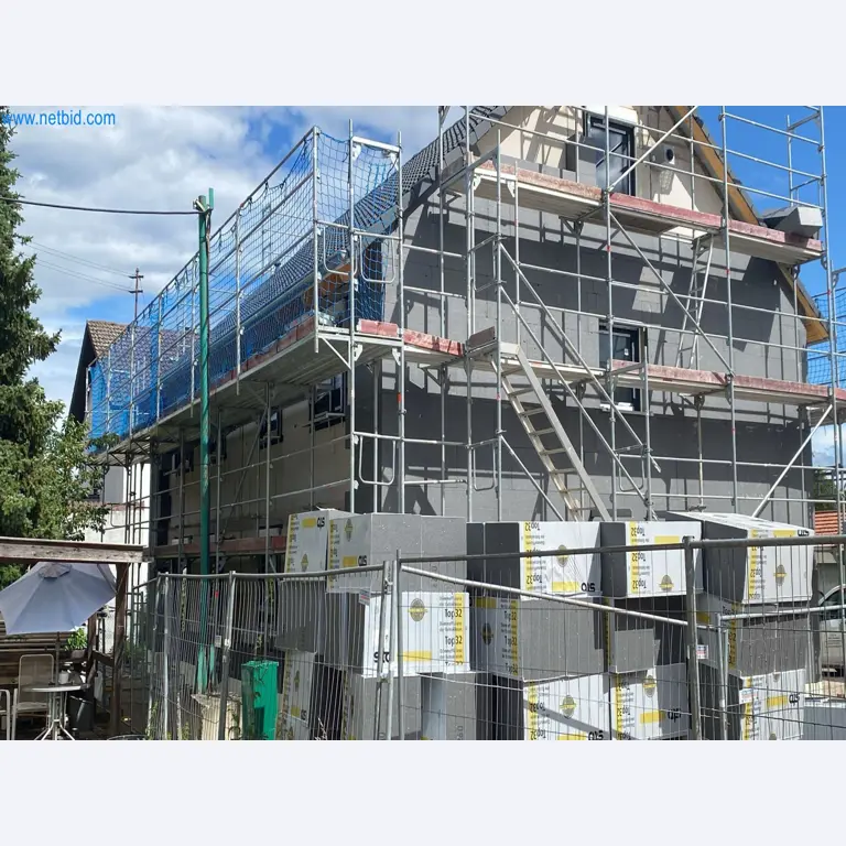 Scaffolding components (some from the construction site), machinery, and vehicles belonging to a construction company-4