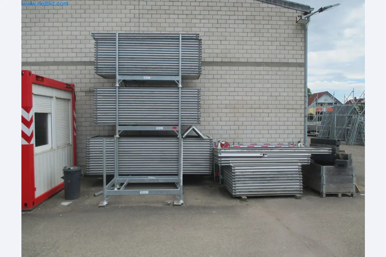 Scaffolding components (some from the construction site), machinery, and vehicles belonging to a construction company-1