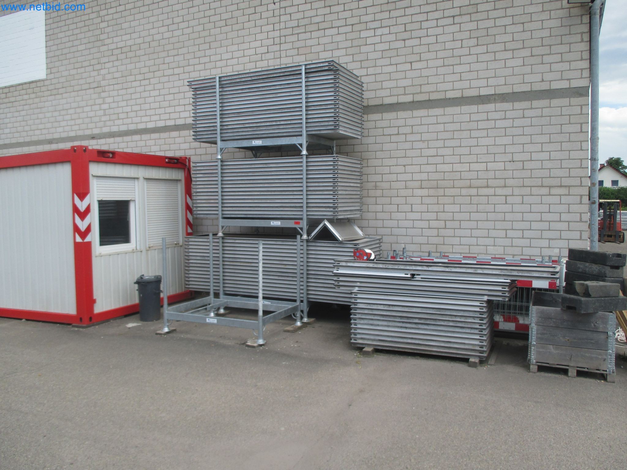 Scaffolding components (some from the construction site), machinery, and vehicles belonging to a construction company-2