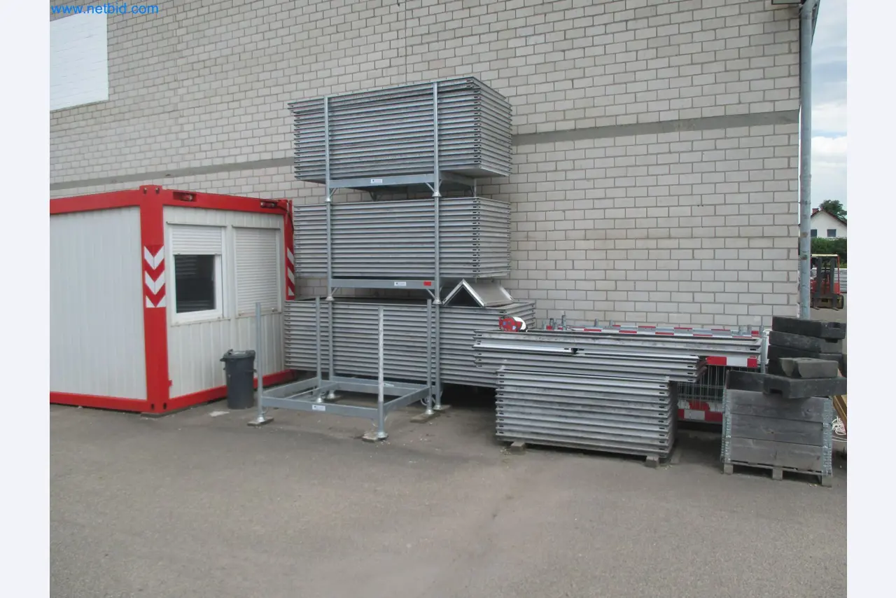 Scaffolding components (some from the construction site), machinery, and vehicles belonging to a construction company-2